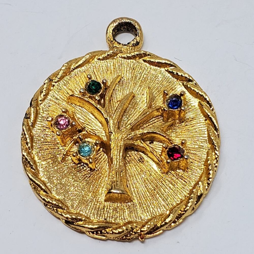 Vintage Gold tone and rhinestone Vintage Gold tone Family Tree Pendent 1" across